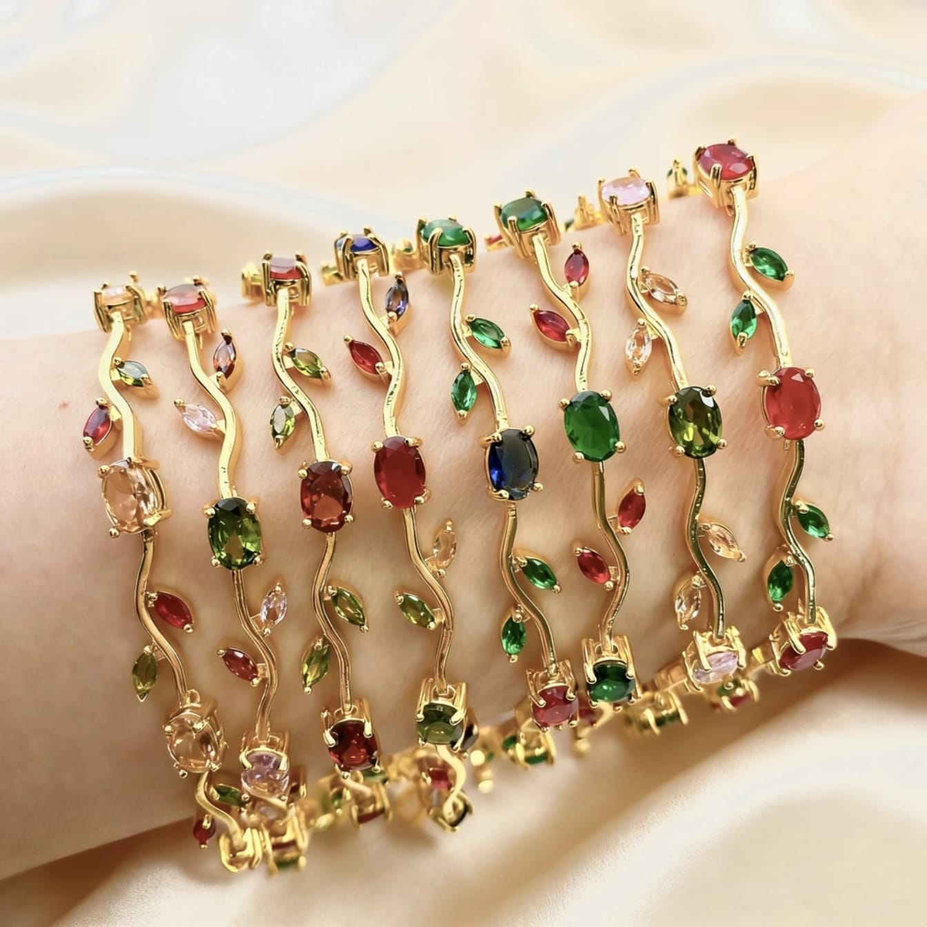 Gold tulip bracelet with multicolored gemstones 